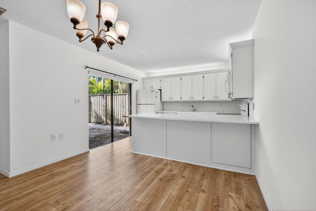 Photo of 310 3rd Court, Palm Beach Gardens, FL 33410 (MLS # R11157481)