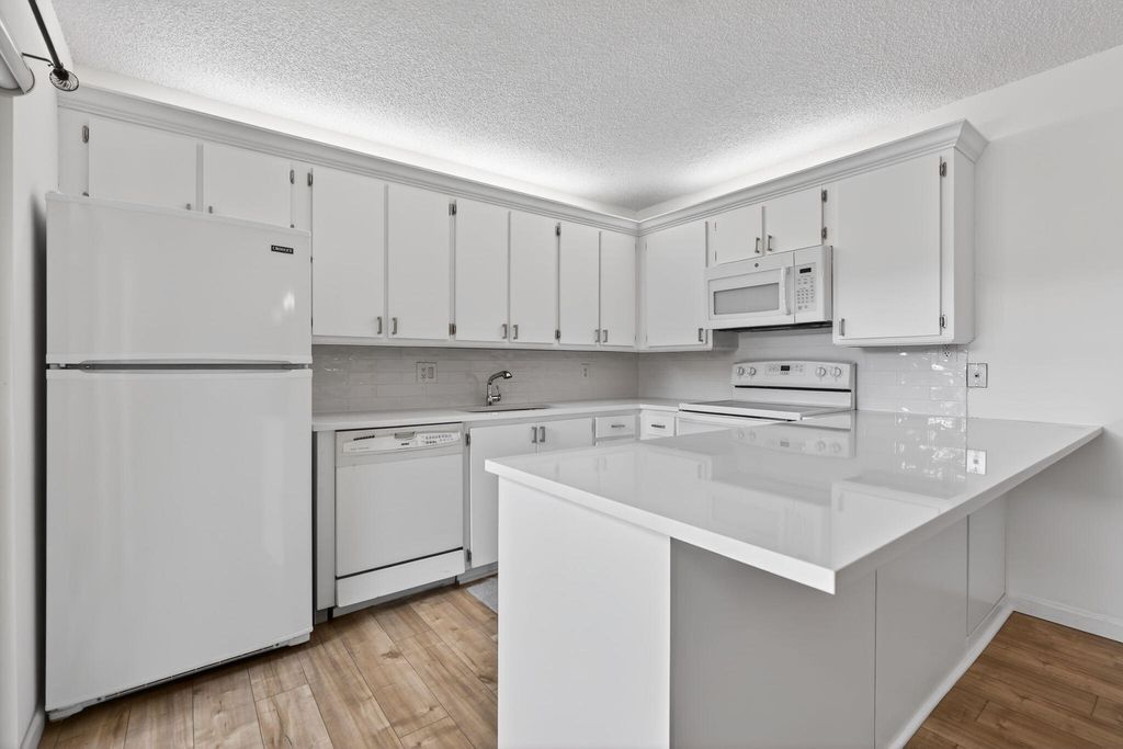 Photo of 310 3rd Court, Palm Beach Gardens, FL 33410 (MLS # R11157481)