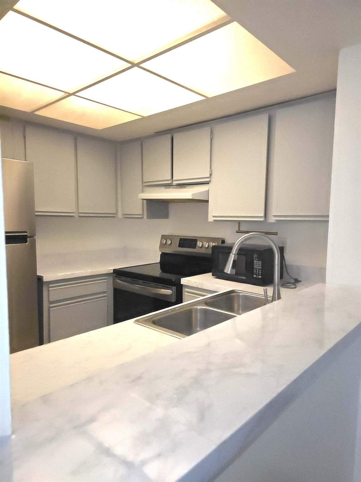MIDPORT PLACE I, A CONDOM - Residential Lease
