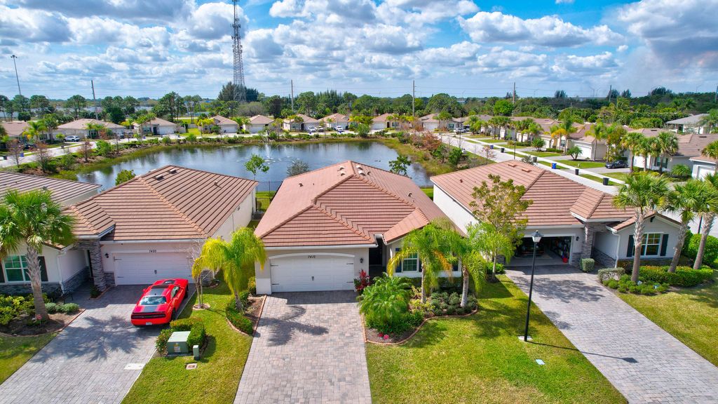 Photo of 7410 SW Harbor Cove Drive, Stuart, FL 34997 (MLS # R10960869)