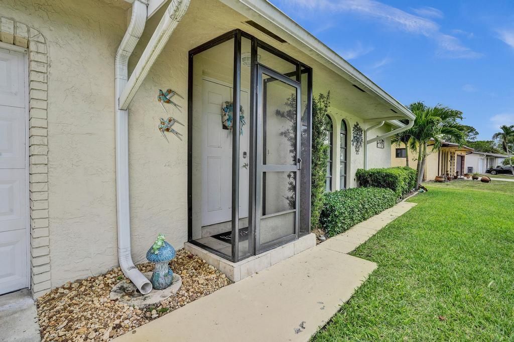 Photo of 14552 Shadow Wood Lane, Delray Beach, FL 33484 (MLS # R11088533)