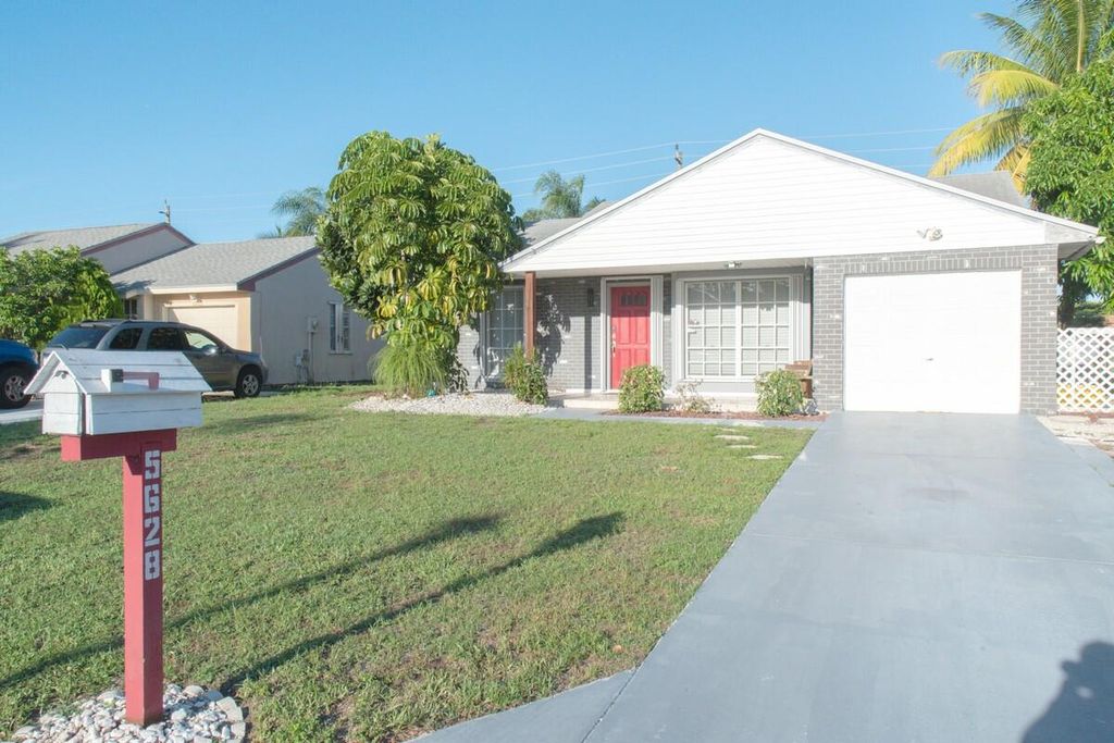 Photo of 5628 Pebble Brook Lane, Boynton Beach, FL 33472 (MLS # R11115225)