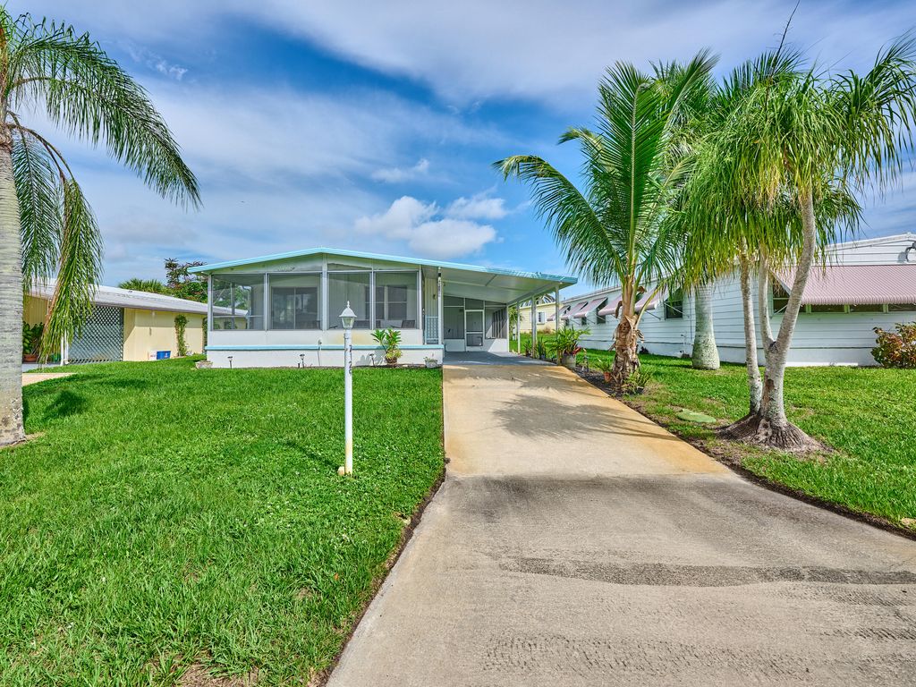 Photo of 7129 SE Bluebird Circle, Hobe Sound, FL 33455 (MLS # R11122730)
