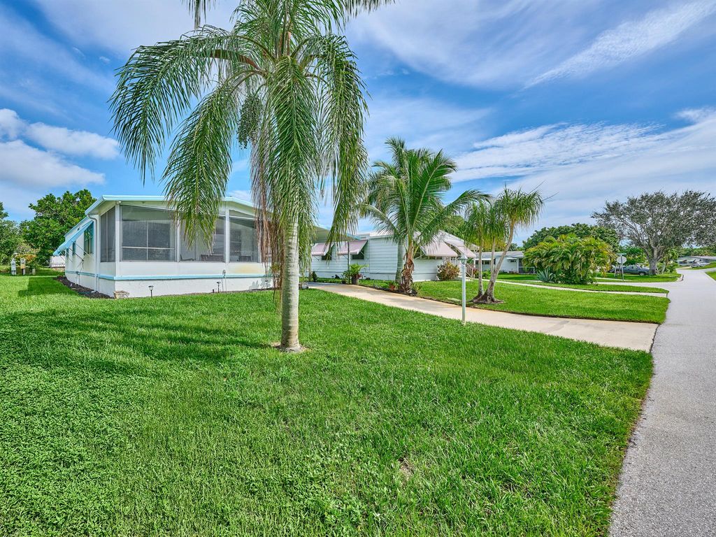 Photo of 7129 SE Bluebird Circle, Hobe Sound, FL 33455 (MLS # R11122730)