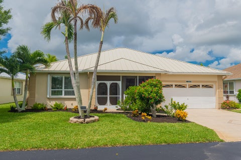 Photo of 1009 NW Tuscany Drive, Port Saint Lucie, FL 34986 (MLS # B26061638)