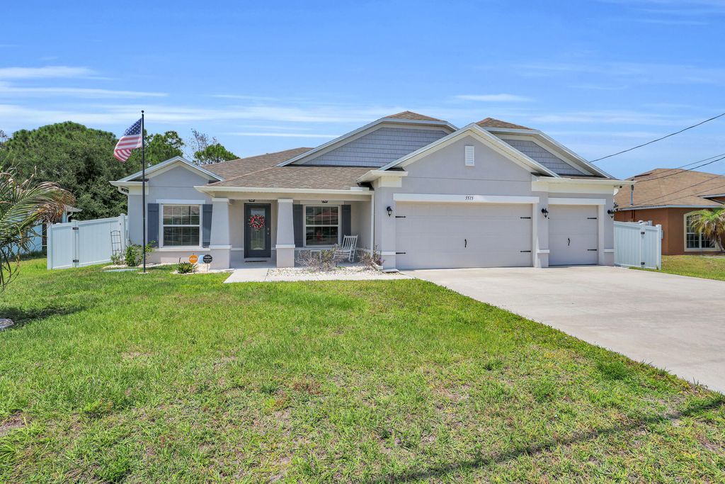 Photo of 5515 NW Whitecap Road, Port Saint Lucie, FL 34986 (MLS # B26026436)