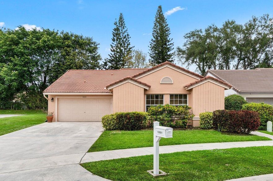 Nestled in the sought after Boca Springs neighborhood, this 3 bedroom, 2 bath home sits on a corner lot in a great location within the community. Inside, you'll find high ceilings that create a spacious feel, and an open floor plan with lots of natural light. The covered screened-in patio is a great spot to relax and leads to a private yard, perfect for outdoor activities. The floor plan is split, with the main bedroom in the back of the home. This bedroom features a spacious walk-in closet and double sinks in the bathroom. There is also a two-car garage with an oversized driveway. The community amenities are only a short walk away. There is a pool for a refreshing swim, a playground for the kids, and tennis, basketball, and volleyball courts for additional fun. Must see!
