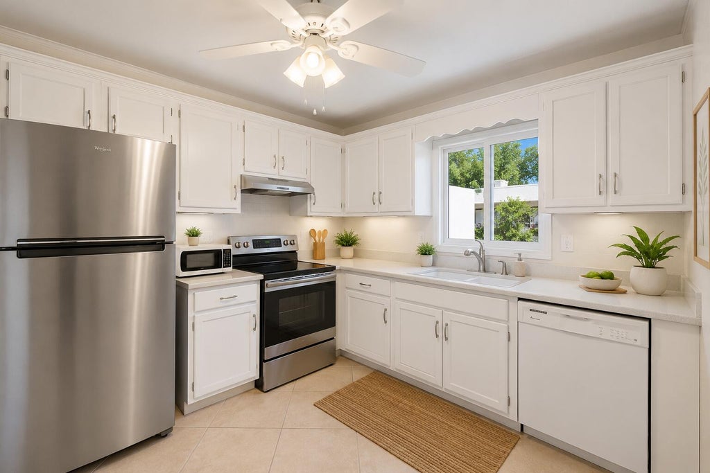 Photo of 1561 NE 12th Terrace #C-14, Jensen Beach, FL 34957 (MLS # R11073967)