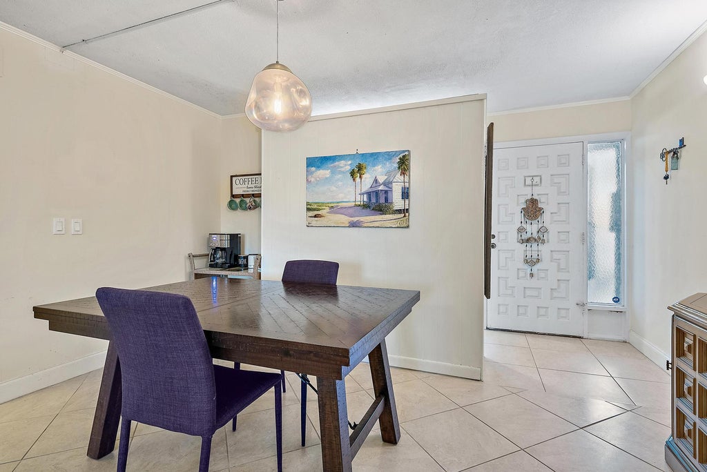 Photo of 1561 NE 12th Terrace #C-14, Jensen Beach, FL 34957 (MLS # R11073967)