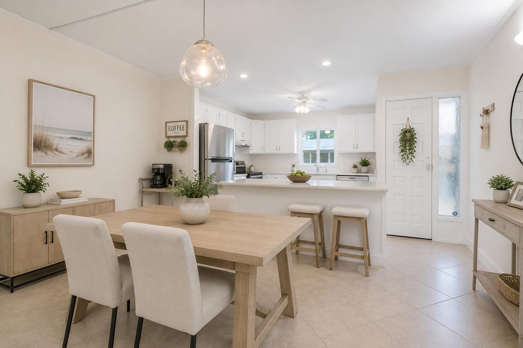 Photo of 1561 NE 12th Terrace #C-14, Jensen Beach, FL 34957 (MLS # R11073967)