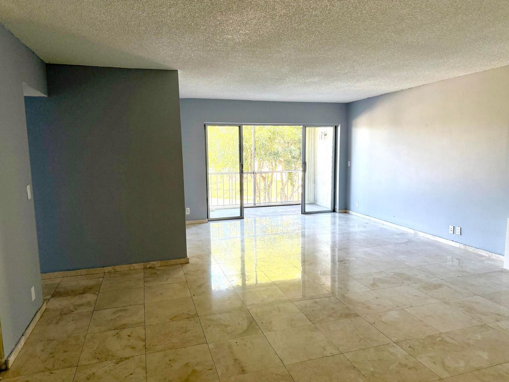 Photo of 505 Spencer Drive #210, West Palm Beach, FL 33409 (MLS # R11160163)