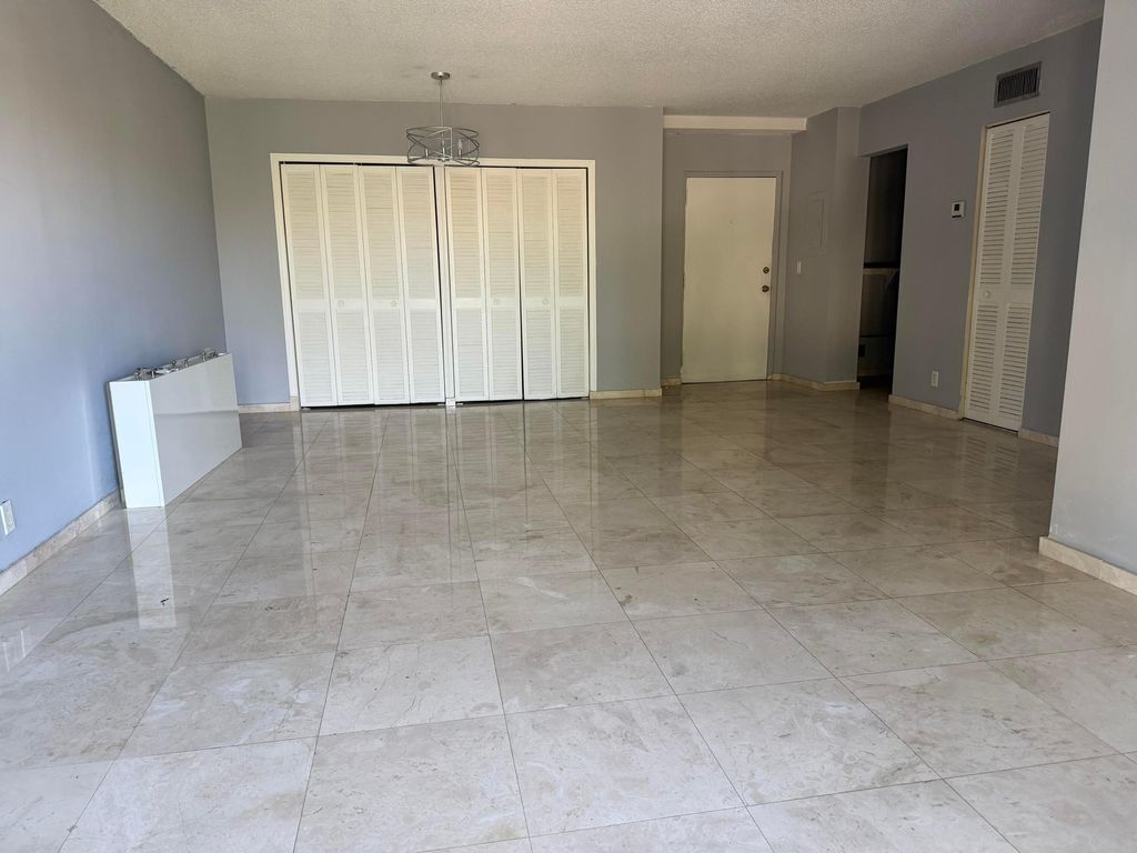 Photo of 505 Spencer Drive #210, West Palm Beach, FL 33409 (MLS # R11160163)
