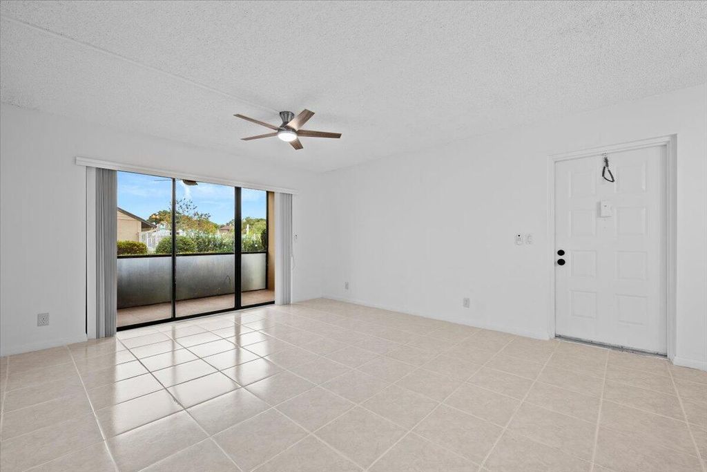 Photo of 708 Sunny Pine Way #B1, Greenacres, FL 33463 (MLS # R11137943)