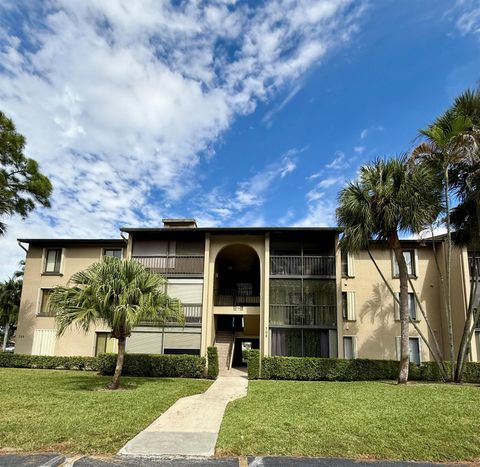 Photo of 708 Sunny Pine Way #B1, Greenacres, FL 33463 (MLS # R11137943)