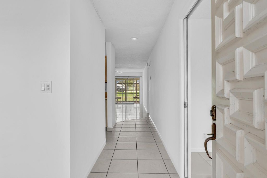 Photo of 13721 Flora Place #D, Delray Beach, FL 33484 (MLS # B26009300)