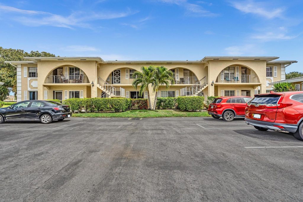 Photo of 13721 Flora Place #D, Delray Beach, FL 33484 (MLS # B26009300)