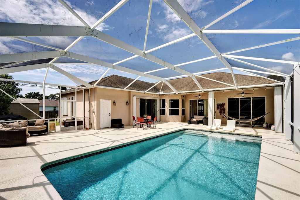 Photo of 1791 SW Bismarck Street, Port Saint Lucie, FL 34953 (MLS # F10523672)