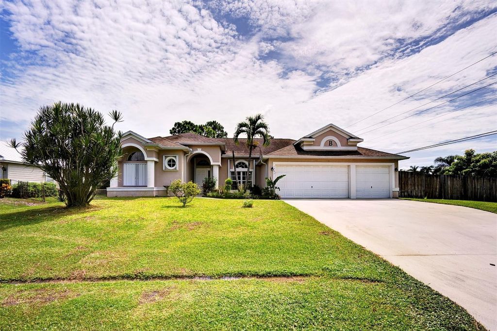 Photo of 1791 SW Bismarck Street, Port Saint Lucie, FL 34953 (MLS # F10523672)
