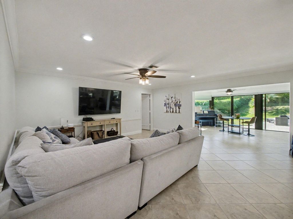 Photo of 720 Muirfield Circle, Atlantis, FL 33462 (MLS # R11159383)