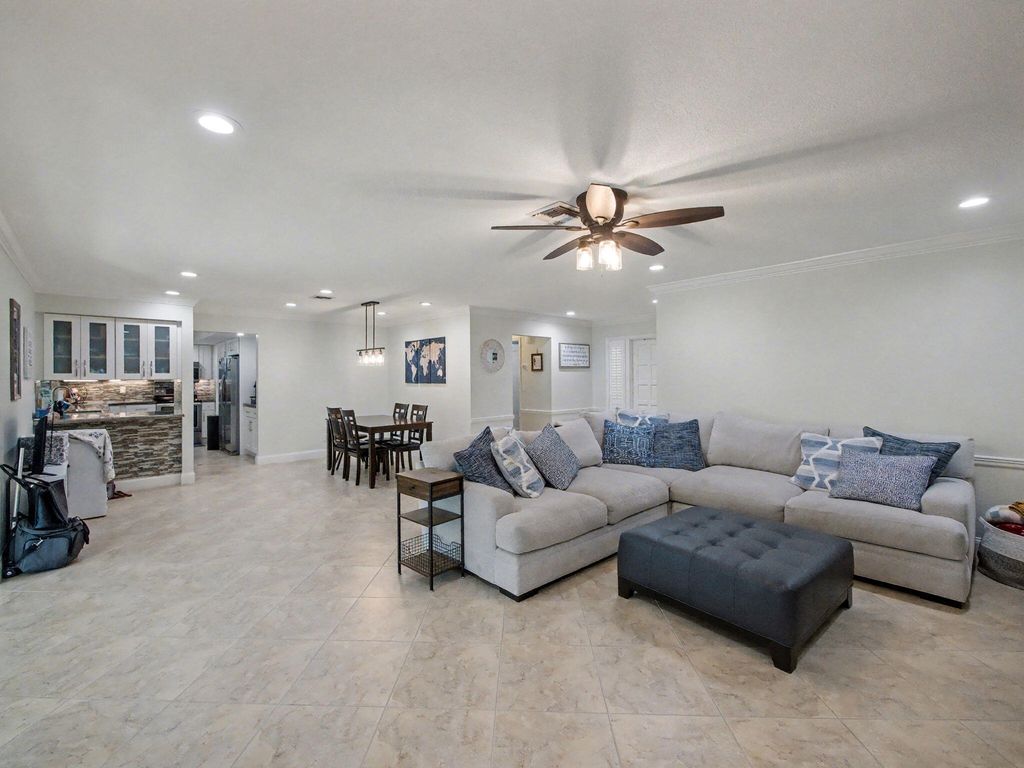 Photo of 720 Muirfield Circle, Atlantis, FL 33462 (MLS # R11159383)