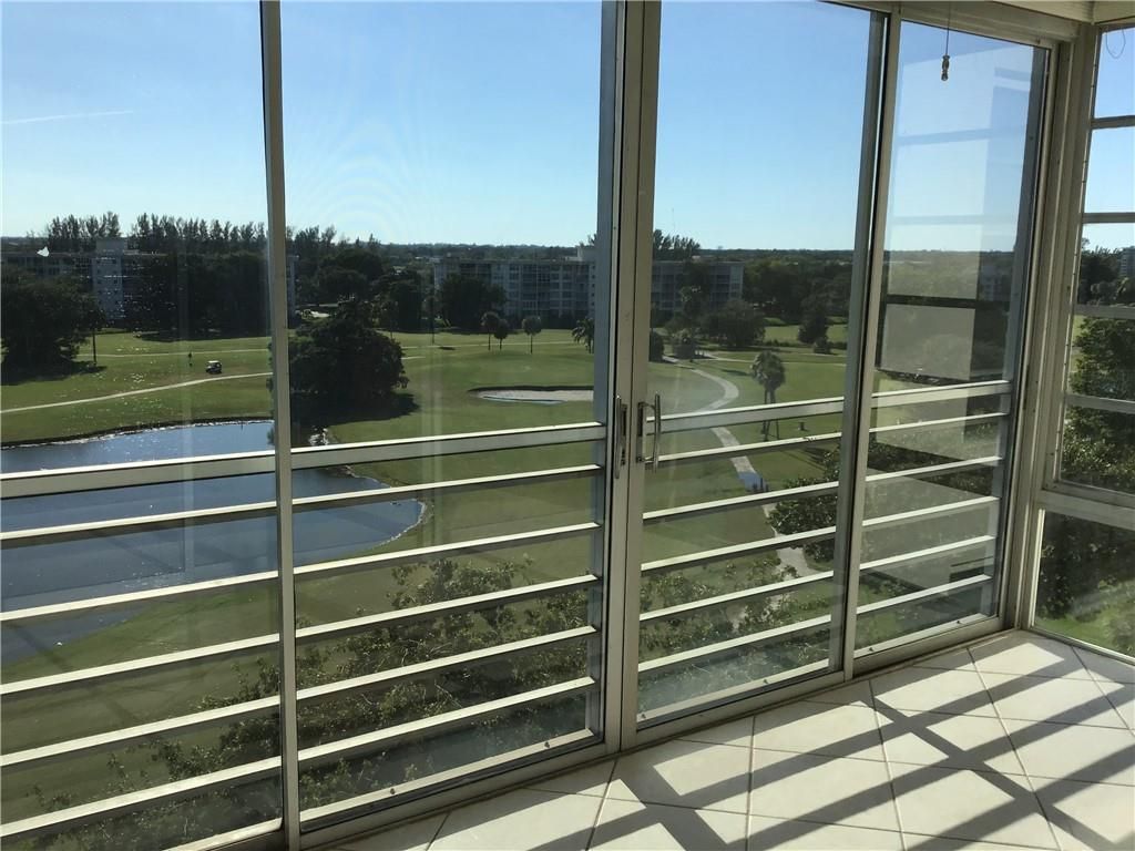 Photo of 2681 S Course Dr #811, Pompano Beach, FL 33069 (MLS # F10309481)