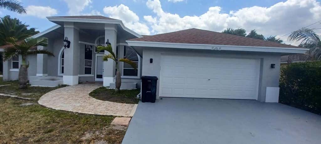 Photo of 202 SW Parish Terrace, Port Saint Lucie, FL 34984 (MLS # F10441325)