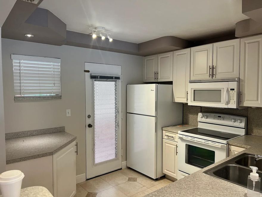 Upgraded and Spacious 1 bedroom 1 & ½ bath PLUS A DEN! A perfect space for those that work for home, or for a nursery room. Located in the heart of Plantation. The property offers an upgraded kitchen, newer appliances, tile throughout, screen patio, New Water Heater. Bright and open living room, a large master bedroom and closet space. The amenities include BBQ area, tennis, heated pool, and gym. Property has been professionally painted. Minimum Credit 650 as per association.