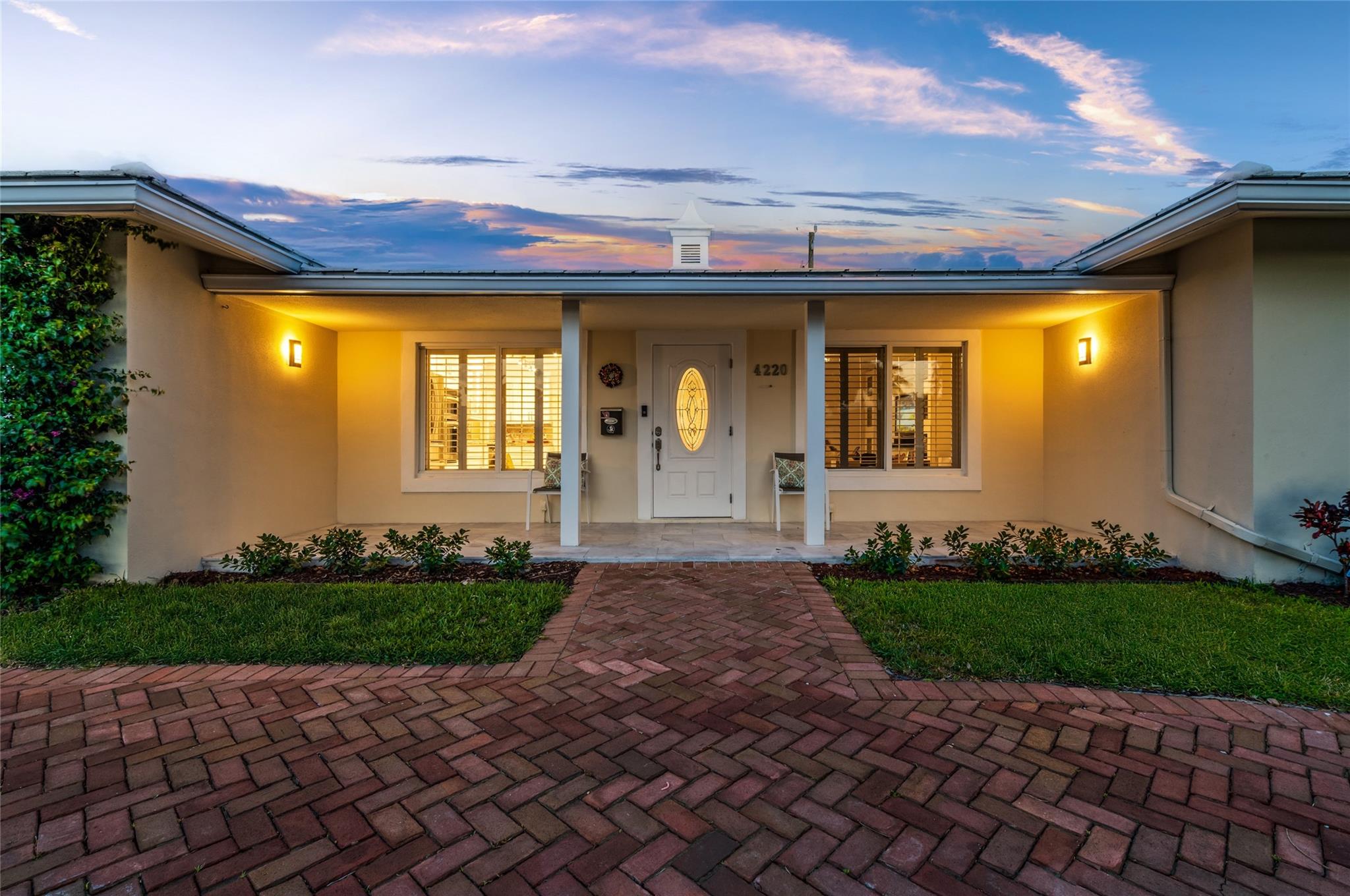 In the desirable Venetian Isles enclave of Lighthouse Point, this stylish garden residence stands, exquisitely finished and impeccably maintained. Light-filled interiors showcase the modern upgrades to the upscale kitchen, three spacious bedrooms and two full bathrooms. Other amenities include impact windows & doors, new paint, pavered driveway, laundry room, 2017 A/C and more. Fenced backyard presented as a secluded tropical oasis with a new resort-style, saltwater pool installed in 2018. An air-conditioned office in the garage can easily revert to a full two-bay garage. Near the Lighthouse Point Yacht Club, this home offers unmatched comfort and convenience.