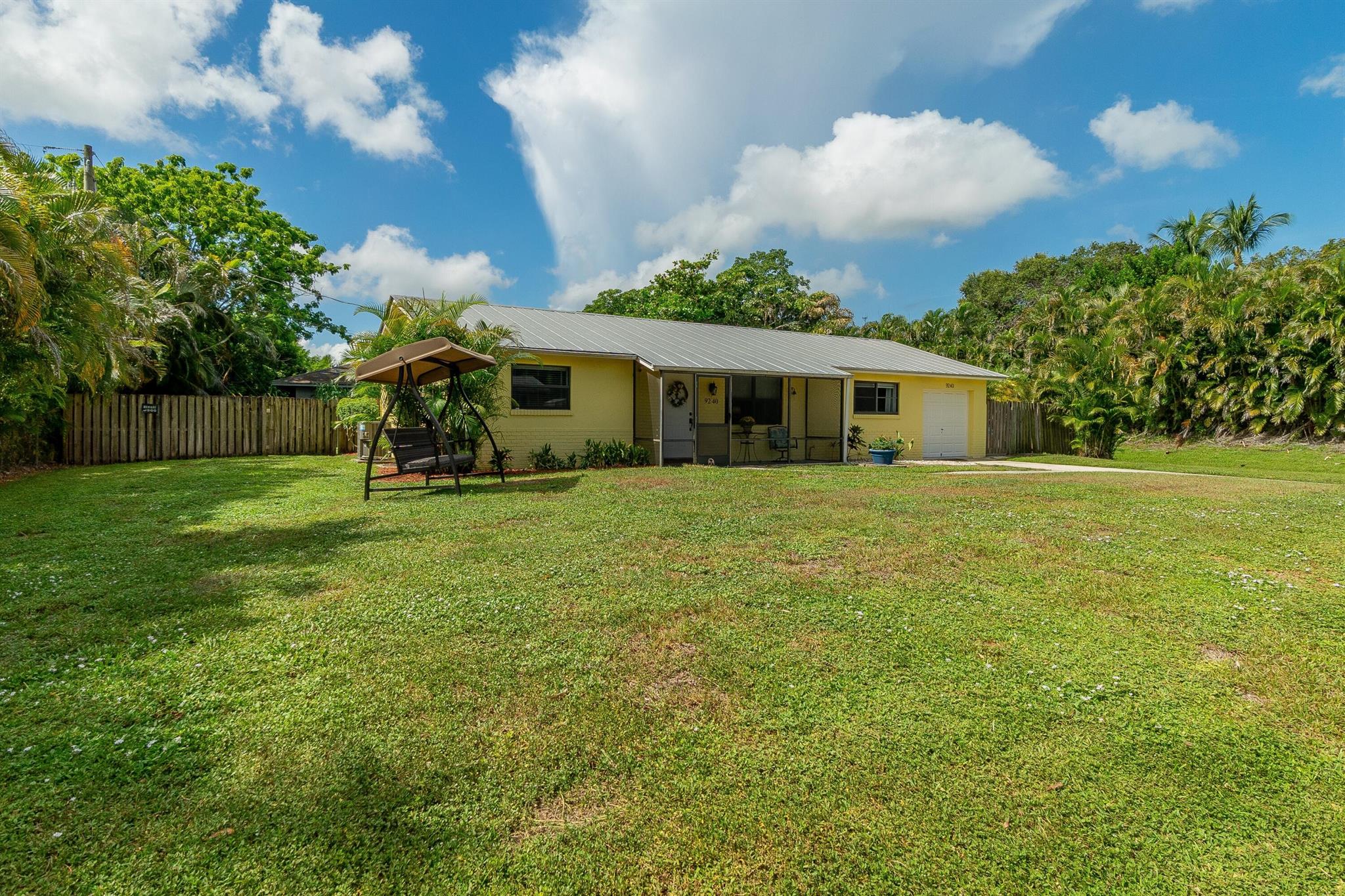 Wonderful 3 Bedroom, 2 full Bathroom Pool Home with one car garage in a NO HOA community - walking distance to the new Dr. Joaquin Garcia High School. New Air Conditioner in 2023, Metal Roof in 2005. All Impact Windows - Tankless Water Heater - new Drainfield in 2021. Large .23 Acre lot at the end of a quiet street is Zoned Agricultural Residential. Fenced in rear yard with your own private pool. Great home for entertaining with the spacious updated kitchen, rear screened-in porch as well as a screened-in front porch! Home has a spacious laundry/utility room off the kitchen which is great for additional storage near the garage. Don't delay - schedule your showing today!