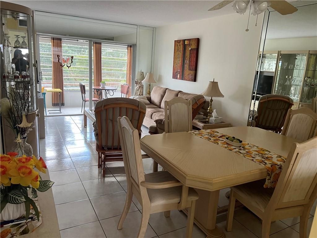 Photo of 2801 NW 47th Ter #404B, Lauderdale Lakes, FL 33313 (MLS # F10373974)