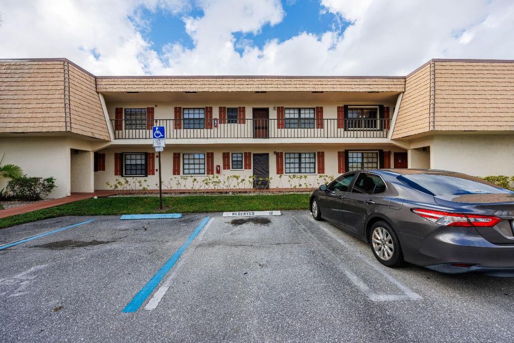 Photo of 4708 Oak Terrace Drive, Greenacres, FL 33463 (MLS # R11154230)