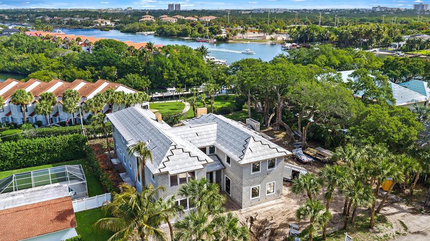 Welcome to 2267 Windsor. This stunning residence, currently under construction, offers the perfect blend of modern elegance and comfortable living. Encompassing over 8,000 total square feet, the home is set on a sprawling 0.45-acre lot with no HOA, providing exceptional privacy and intracoastal views. Featuring 5 bedrooms, 6.5 baths, a den, club room, and private elevator, this thoughtfully designed home delivers both luxury and functionality. Built with entertaining in mind, the property boasts a prep kitchen and expansive covered patio spaces, with. a heated pool and spa, ideal for year-round enjoyment. An exceptional opportunity to own a dream home in the heart of Palm Beach Gardens.