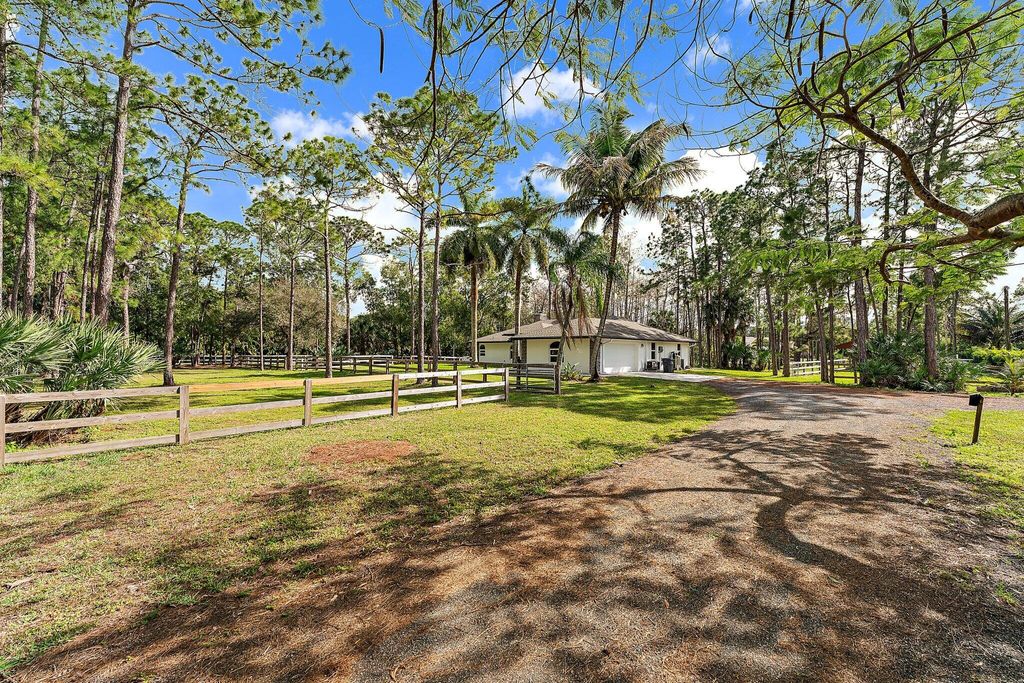 Photo of 16528 Temple Boulevard, Loxahatchee, FL 33470 (MLS # R10957562)