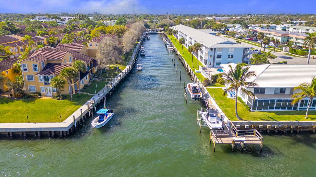 Photo of 1135 Lake Shore Drive #206, Lake Park, FL 33403 (MLS # R11163194)