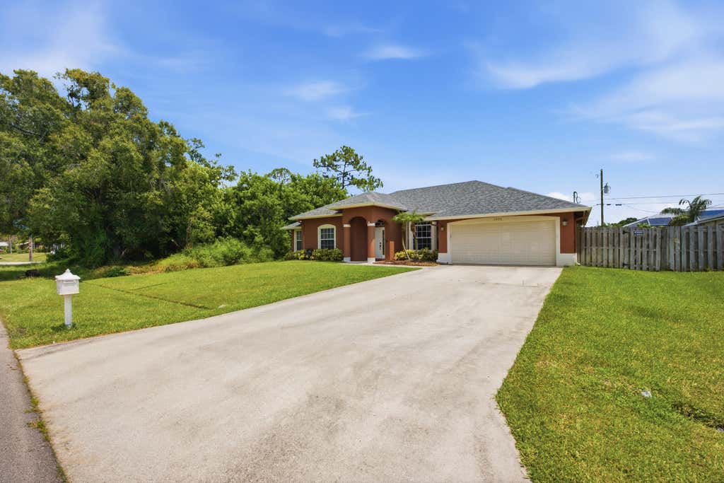 Photo of 1526 SW MULLINAX Avenue, Port Saint Lucie, FL 34953 (MLS # B26059851)