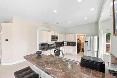 Tiny photo for 1526 SW MULLINAX Avenue, Port Saint Lucie, FL 34953 (MLS # B26059851)