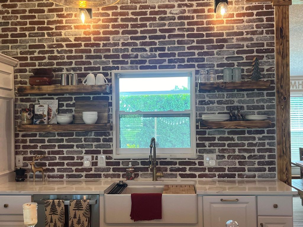 Photo of 2457 SE Shipping Road, Port Saint Lucie, FL 34952 (MLS # R11098978)