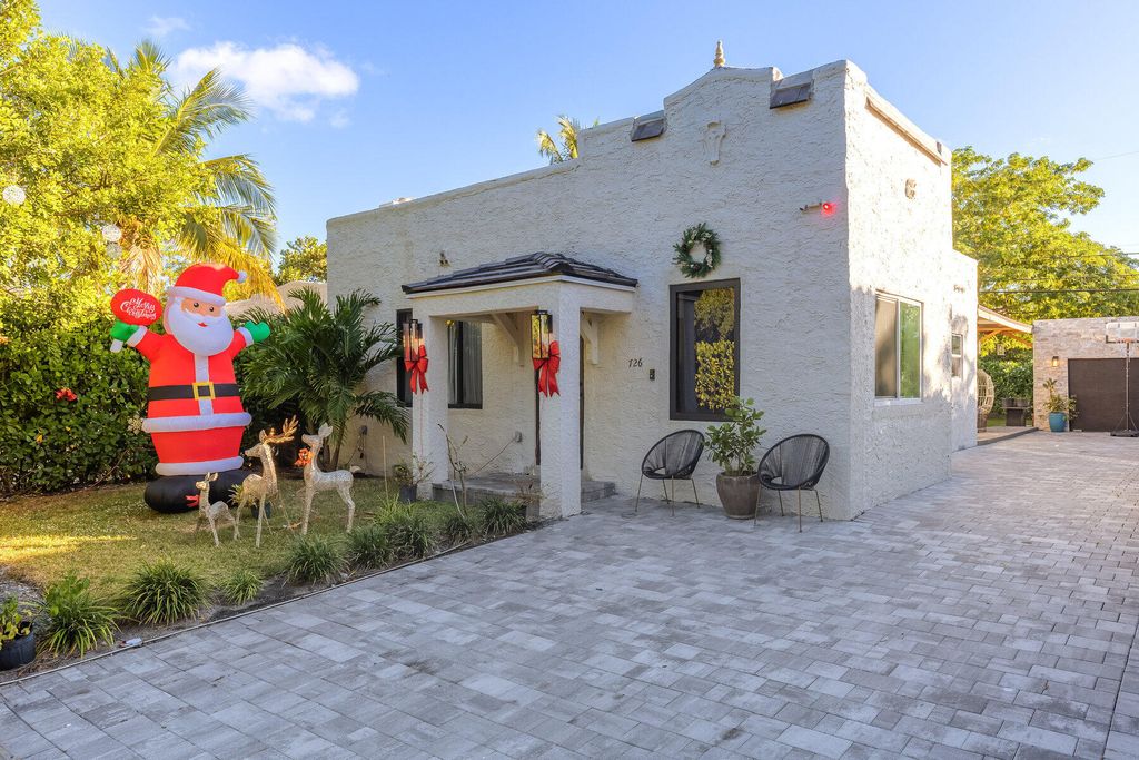 Photo of 726 Lytle Street, West Palm Beach, FL 33405 (MLS # B26012733)