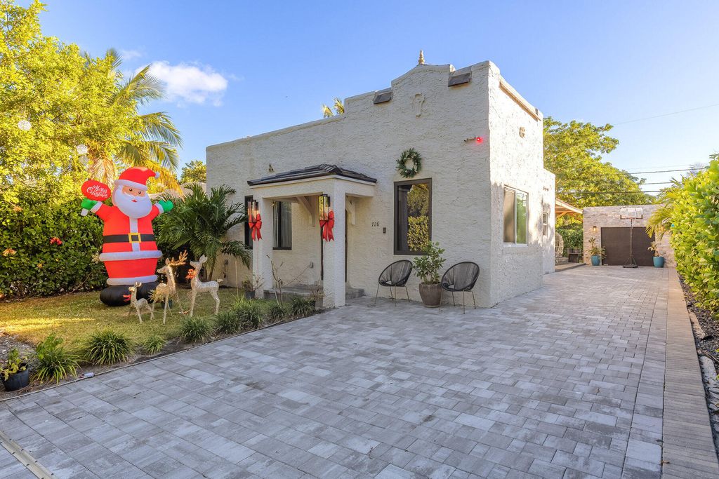 Photo of 726 Lytle Street, West Palm Beach, FL 33405 (MLS # B26012733)