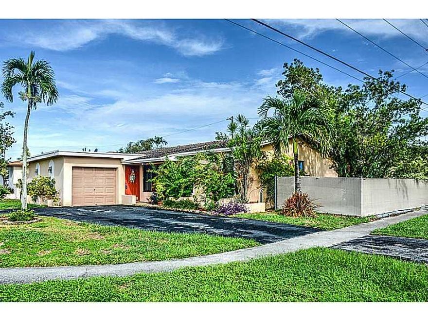 Popular 3/2 model with family room and eat-in kitchen.  Updated kitchen with all  stainless steel appliances purchased within past 5 years., dishwasher  2015!    Updated baths!  Impact windows, plus hurricane shutters for sliders.   Pool and deck resurfac ed  in 2011.  Salt water chlorinator for pool makes for easy maintenance!  a/c compressor replaced in 2014!  Tile in all living areas; laminate in bedrooms.    Great family home in great family neighborhood.