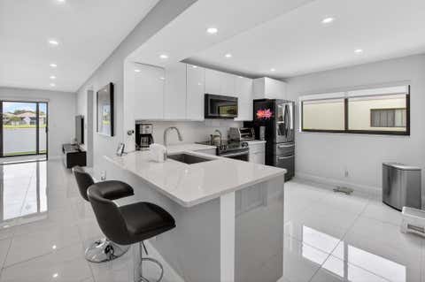 Photo of 15401 Pembridge Avenue #15, Delray Beach, FL 33484 (MLS # B26034142)