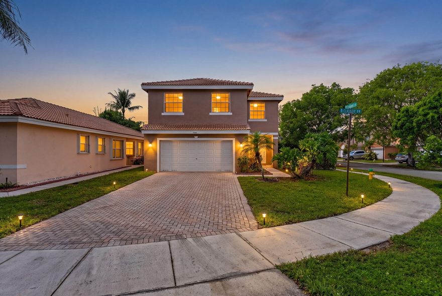 Open and bright two story home. All bedrooms upstairs. low HOA fees, Sterling/University, great community in the center of Davie, All tiled floor, family, dinning, laundry rooms,  2 cars garage with electric car hook up, across the street from the community pool, close to shopping and main roads, one of the best school zone in Broward county.
