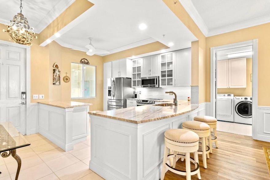 Located in the highly sought after Harbour Isle, this 2BD, 2BA, 1,989 sq.ft. corner unit condo feat. full impact windows, whole-unit water filtration system, LVP flooring throughout & built-in 60'' natural stone veneer fireplace overlooking the harbor. Recent upgrades include 2 renovated bathrooms, both with frameless shower doors & porcelain tile as well as a fully renovated kitchen, equipped with 42'' soft-close cabinets w/ LED lighting, level 4 granite countertops & Samsung SS appliances. Tie in a luxurious amenity center w/ a heated pool & clay Tennis courts & you have yourself a keeper!