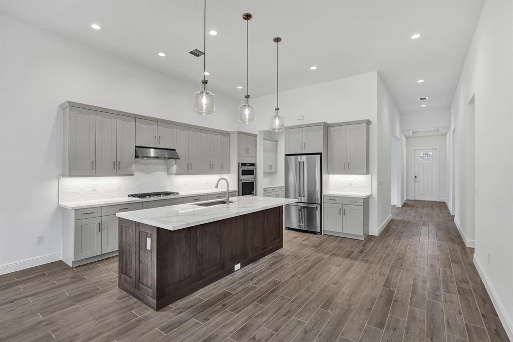 Photo of 130 SE Palma Street, Port Saint Lucie, FL 34984 (MLS # R11112824)