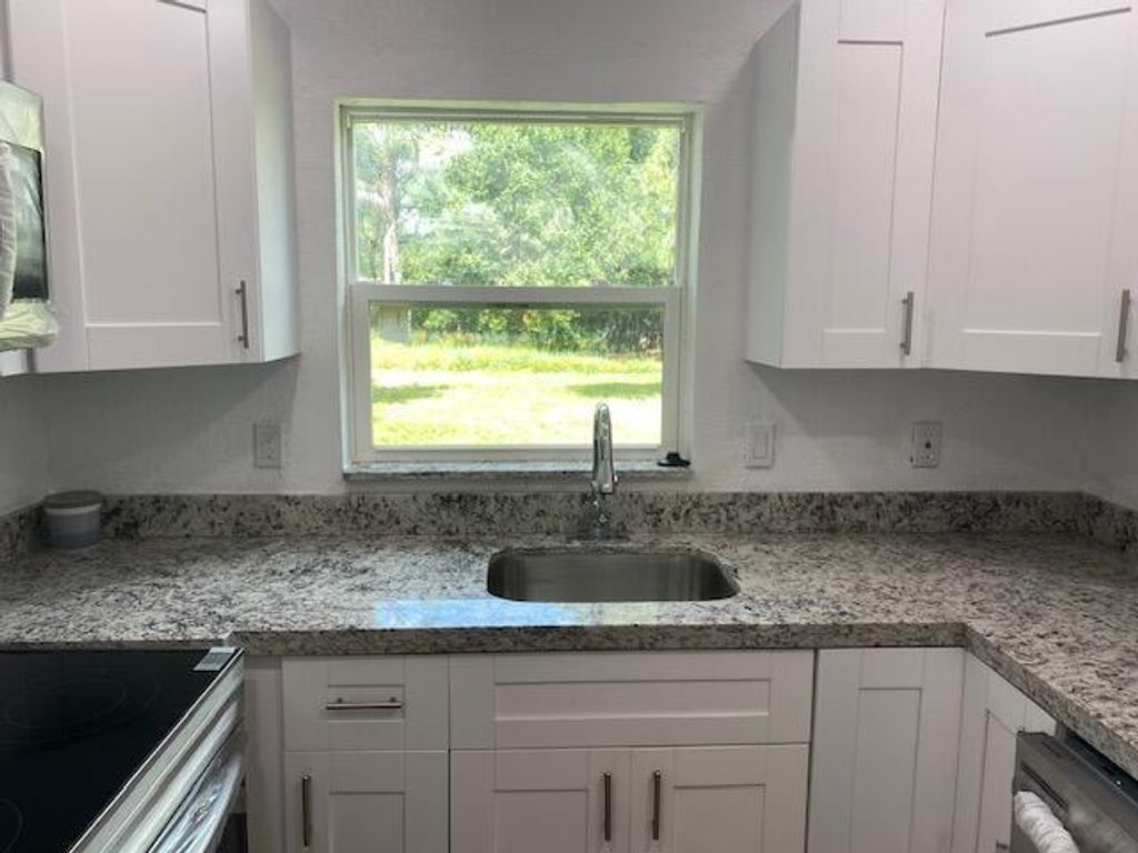 Photo of 507 S 22nd Street #A, Fort Pierce, FL 34950 (MLS # R11100009)