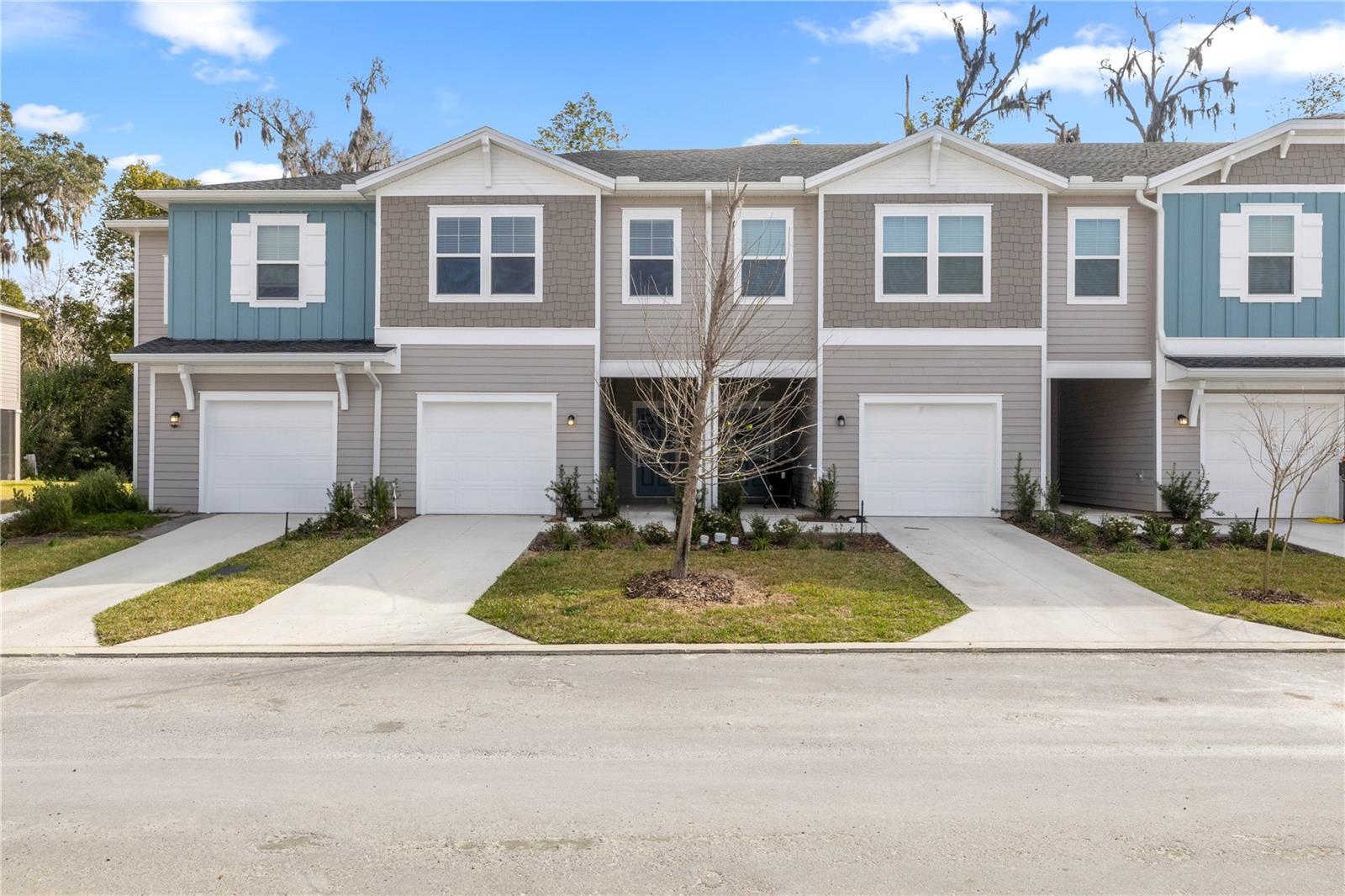 New Lennar townhome available starting July 28, 2025, in the highly sought-after Oak Hammock Preserve community in southeast Ocala. This spacious Lincoln model features 3 bedrooms, 2.5 bathrooms, and a one-car garage. The unit includes upgraded finishes such as 5 ceiling fans, a stylish kitchen backsplash, and a chandelier-style light fixture in the dining area. Enjoy a low-maintenance lifestyle with high-speed internet, trash collection, lawn care, washer, and dryer all included in the rent. Conveniently located near hospitals, shopping centers, schools, and just minutes from downtown Ocala. Don't miss the opportunity to be the first to live in this beautiful new home in Oak Hammock Preserve.