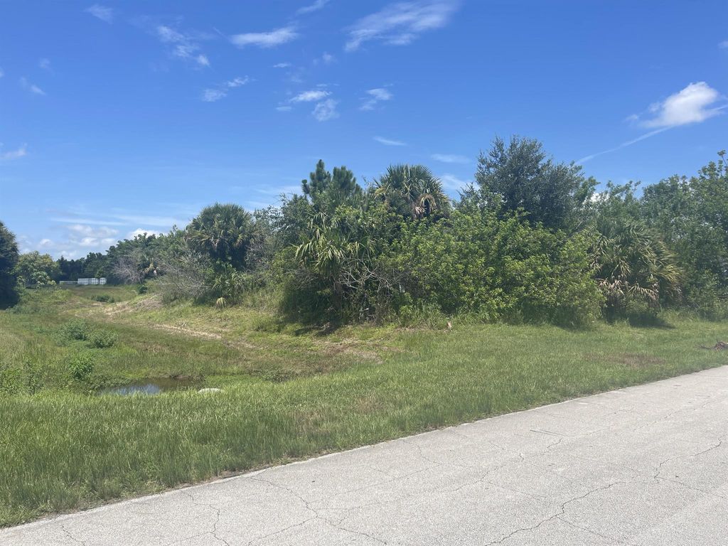 Photo of 4492 SW Tabor Street, Port St Lucie, FL 34953 (MLS # R10908836)