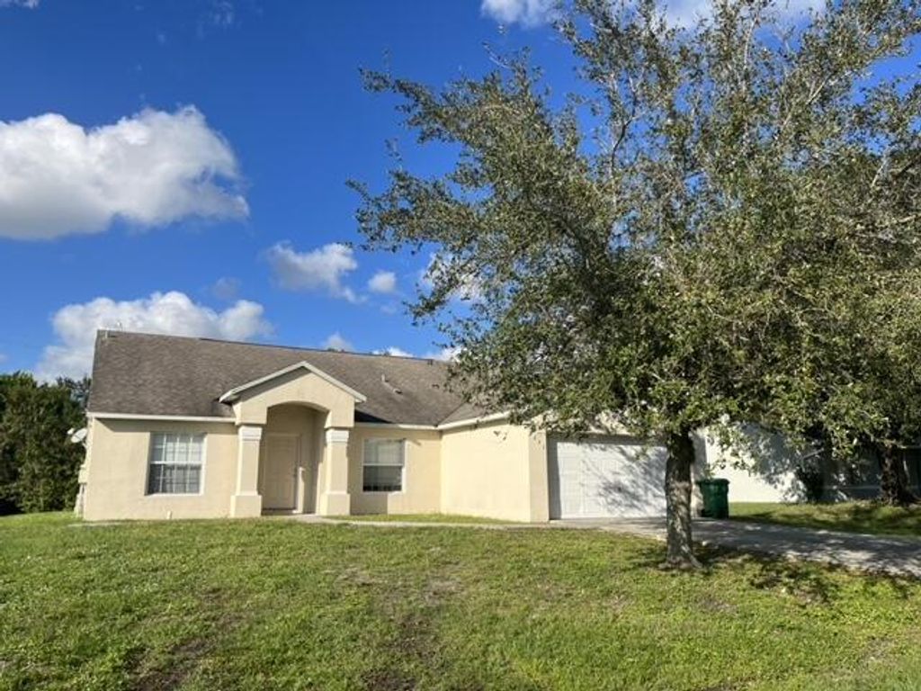 Photo of 1231 SW Parma Avenue, Port St Lucie, FL 34953 (MLS # R10887229)