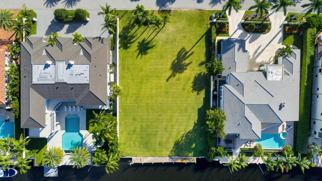 Photo of 495 E Alexander Palm Road, Boca Raton, FL 33432 (MLS # R11140365)