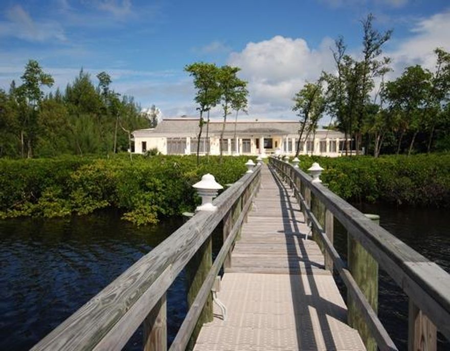 Spectacular European villa on 5.24 acres features 200' of direct Intracoastal frontage and private yacht dock. Built to the highest construction standards and recently updated interiors and landscaping.